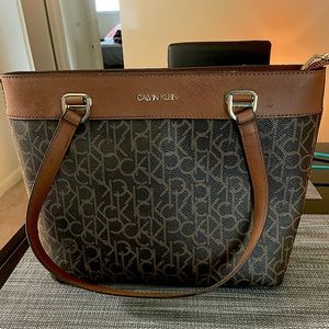 Calvin Klein hand bag with emblem all over
